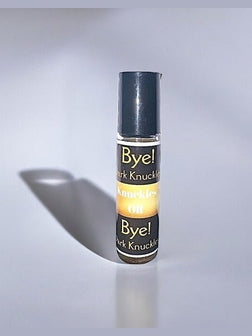 Bye! Dark Knuckles Treatment Oil in a sleek roller bottle for reducing dark knuckles