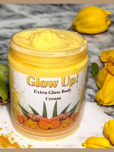 Glow Up Extra Glow Body Cream in Yellow Jar with Turmeric and Floral Accents for Hydrating Skin