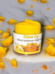Glow Up Ultra Luminous Night Cream in a jar surrounded by yellow flower petals for radiant skin