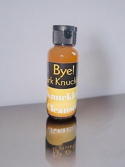 Bye! Dark Knuckles Cleansing Solution in amber bottle for effective skin cleansing