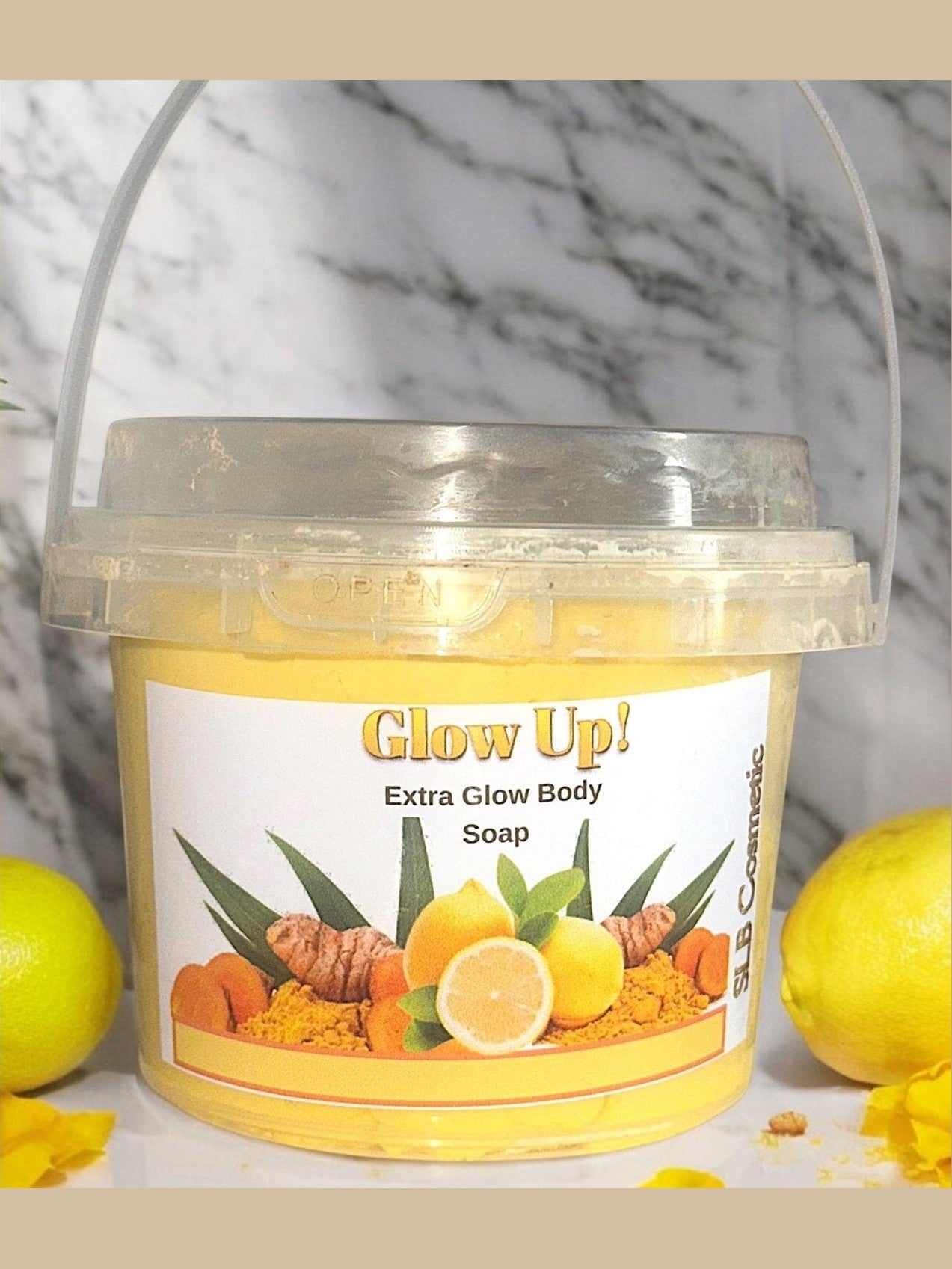 SLB Market Glow Up Extra Glow Body Soap in a clear tub with lemon and turmeric ingredients